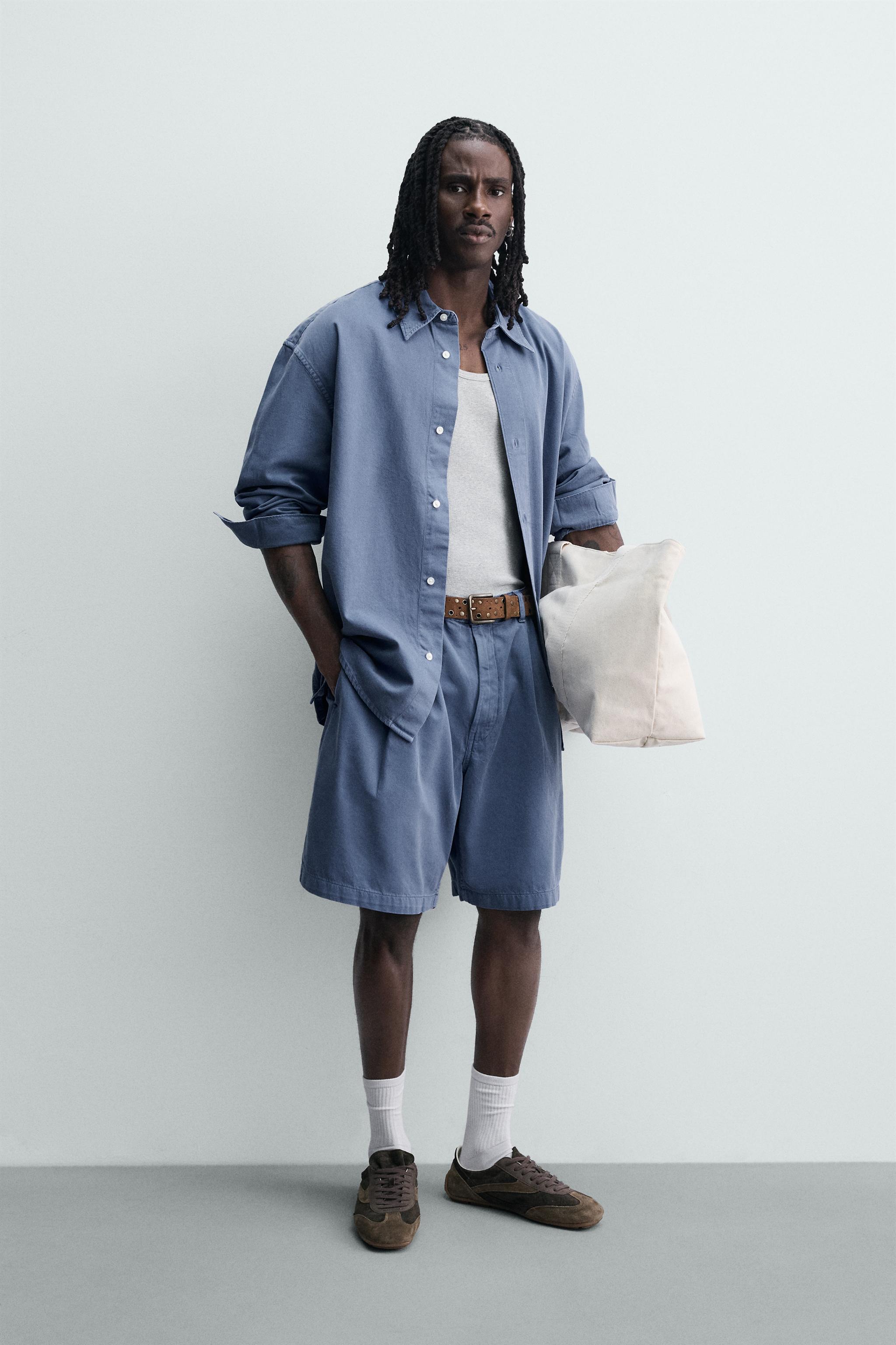 SHORT DÉLAVÉ À PLIS